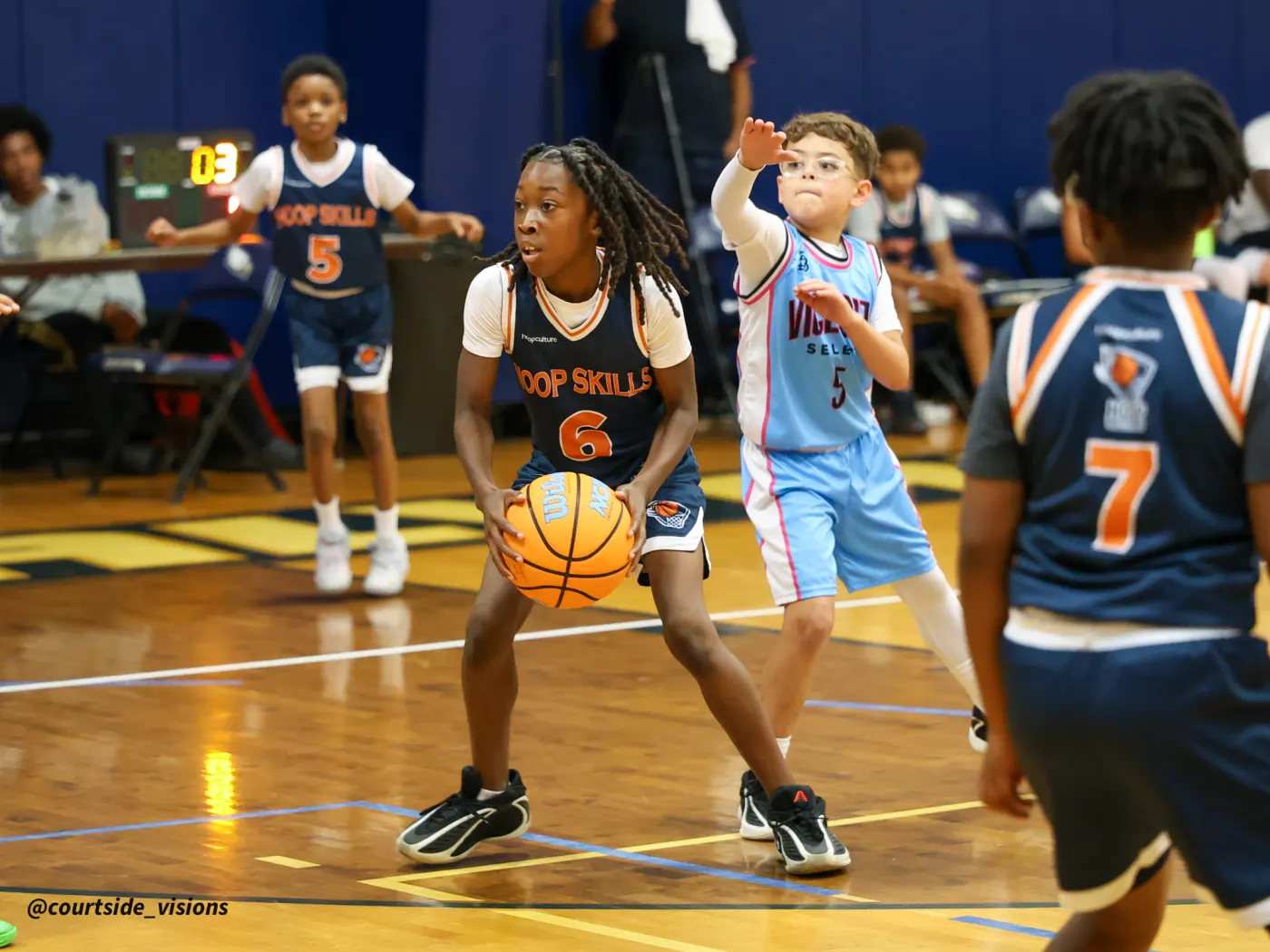 Hoop Skills player dribbling up the court